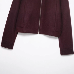 Women's burgundy short jacket featuring wool-like fabric and silver metal zipper closure