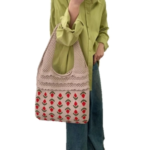 Women's knitted tote bag with red strawberry patterns and beige crochet mesh design