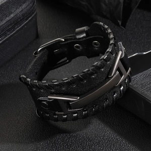 Retro black braided leather bracelet for men featuring a turquoise stone and metal clasp