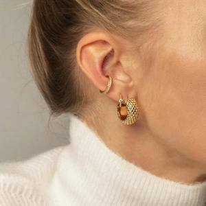 Minimalist gold S925 silver needle hoop earrings with pavé diamonds on model wearing sweater