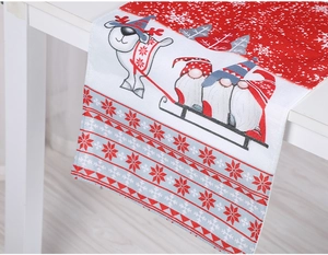 Detail of Christmas table runner with festive gnomes, reindeer, and snowflake patterns