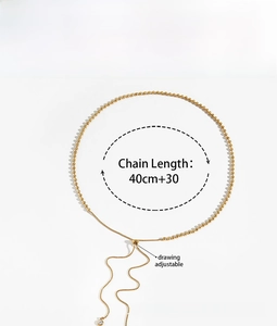 Detail of adjustable 18K gold stainless steel bead necklace with zircon pendant