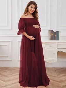 Detail of off-shoulder wine red tulle maternity gown with ruffled sleeves and tiered skirt