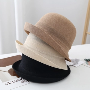 Elegant knitted paper fiber cloche hats for women in brown, beige, and black colors