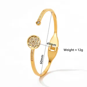 Gold stainless steel star flower bangle with crystals and 49x60mm inner diameter dimensions