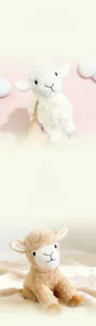 Close-up of soft curly plush lamb toys in white and brown with cute embroidery details