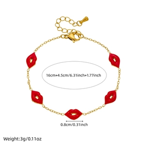 Bracelet en acier inoxydable doré avec cinq pendentifs lèvres émaillées rouges et fermoir