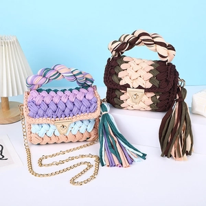Handmade crochet woven crossbody bag with twist handle, stylish casual shoulder bag for women.