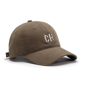 Brown cotton baseball cap with white embroidered CH letters and adjustable back strap