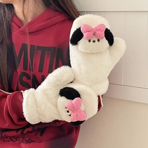 Close-up of white plush mittens with Pochacco-style cartoon dog and pink bow details