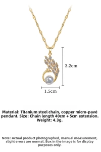 Detail showing peacock pearl pendant dimensions 3.2cm by 1.5cm on gold steel chain