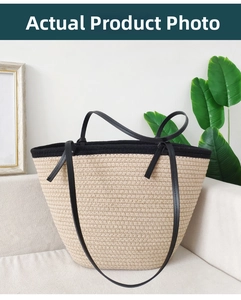 Detail of hand-woven cotton rope tote bag with black handles for summer beach travel