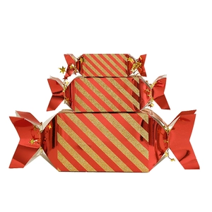 Three-piece set of red and gold striped candy-shaped gift boxes in various sizes
