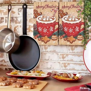 Kitchen scene with Christmas towels featuring gingerbread man and Merry Christmas text