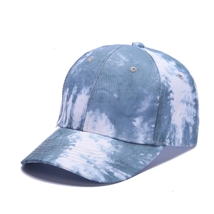 Detail shot of the blue and white tie-dye fabric and stitching on the baseball cap