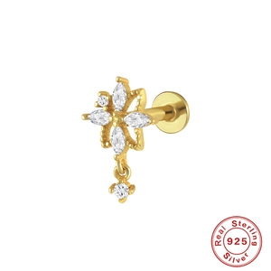 Detailed view of S925 sterling silver gold stud with zircon cross and floral motif