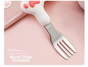 Detail of cute 304 stainless steel fork with polished tines and cat paw handle design