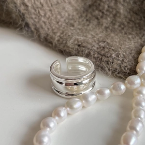 Minimalist 925 sterling silver open ring with triple parallel line design on white pearls