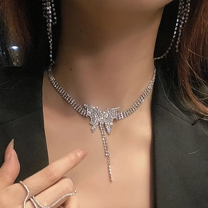 Elegant silver butterfly necklace with sparkling rhinestones and delicate tassel for women