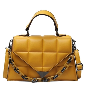 Chic yellow quilted rhombic shoulder bag with top handle and metallic chain strap