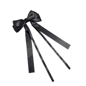 Elegant black satin ribbon bow hair clip with flowing tassels on a white background