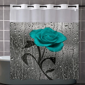 Detail of waterproof shower curtain with blue rose print and transparent mesh header