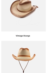 Detail of vintage orange straw cowboy hat with a wide brim and adjustable chin strap