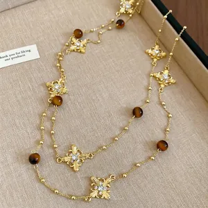 Tiger eye cross necklace with diamond accents and gold chain for women's vintage style