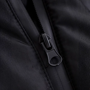 Close-up of black technical fabric with high-quality zipper and waterproof coating