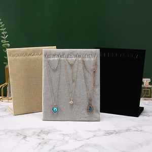 Vertical velvet jewelry display stands for necklaces in beige linen, grey and black colors