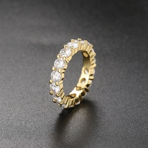 Macro detail of 4mm gold-plated eternity ring featuring micro-paved round zircons