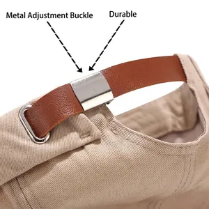 Beige canvas brimless dockers hat with adjustable brown leather strap and metal buckle