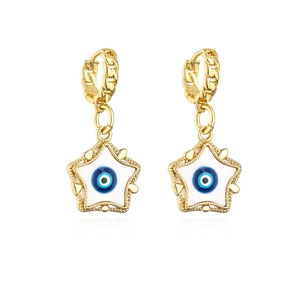 Detail of 18K gold star earrings featuring blue and white enamel evil eye designs