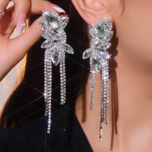 Sparkling crystal rhinestone tassel earrings in silver bow shape for elegant women