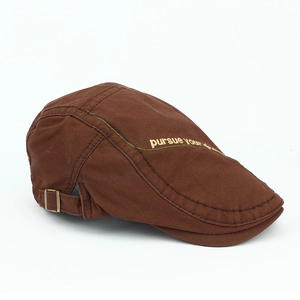 Detailed embroidery reading 'pursue your dreams' on a cotton duckbill cap with metal buckle