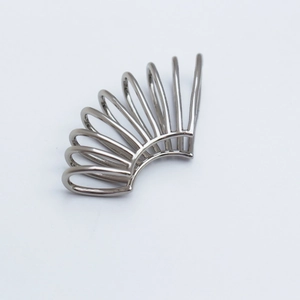 Minimalist silver metal spiral ear cuff with a multi-layered hollow spring wire design