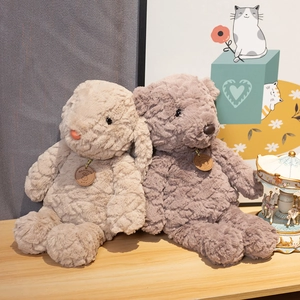 Plush beige bunny and brown bear dolls made of soft faux fur for room decoration