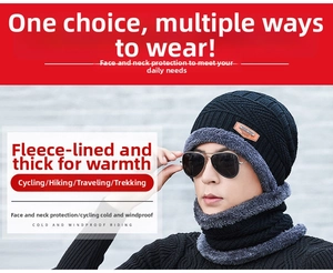 Detail of warm black knitted beanie with thick grey fleece lining and matching neck warmer