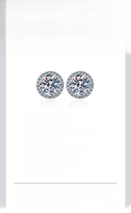 Macro view of S925 silver stud earrings featuring 1ct Moissanite in a halo setting
