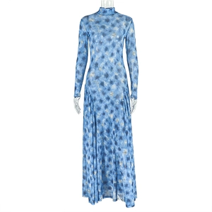 Detailed view of the sheer mesh fabric and blue abstract art print on this midi dress