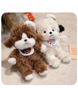 Close-up of cute plush teddy puppy toys with white hats and decorative lace bibs