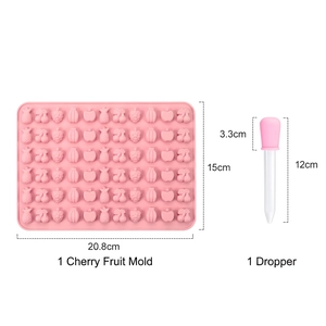 Pink silicone fruit mold set with dropper for gummy jelly including pineapple and cherry