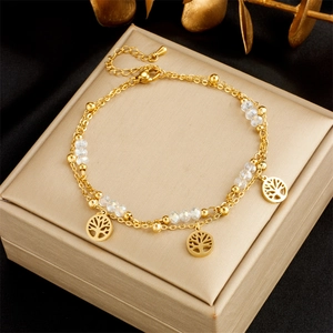Gold double-layered stainless steel anklet with Tree of Life charms and clear beads