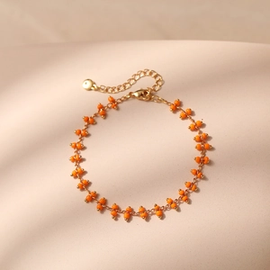 Detail of Bohemian beaded bracelet with gold chain and adjustable lobster clasp
