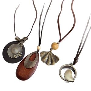 Retro long sweater necklace set with wooden beads and bronze leaf bird pendants