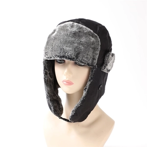 Winter thermal trapper hat with ear flaps in black fabric and grey faux fur lining