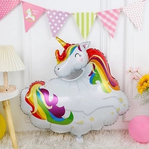 Detailed view of a 3D unicorn foil balloon with rainbow mane for birthday party decor