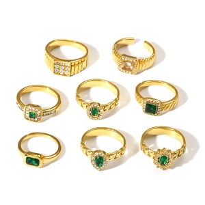 8-piece gold-plated ring set with emerald green zircon in various elegant shapes