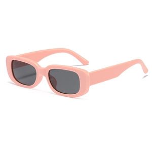 Retro rectangle kids sunglasses with light pink jelly frame and dark gray lenses