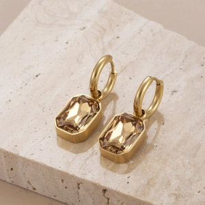 Chic gold-plated titanium steel earrings with rectangular champagne zircon drop dangles